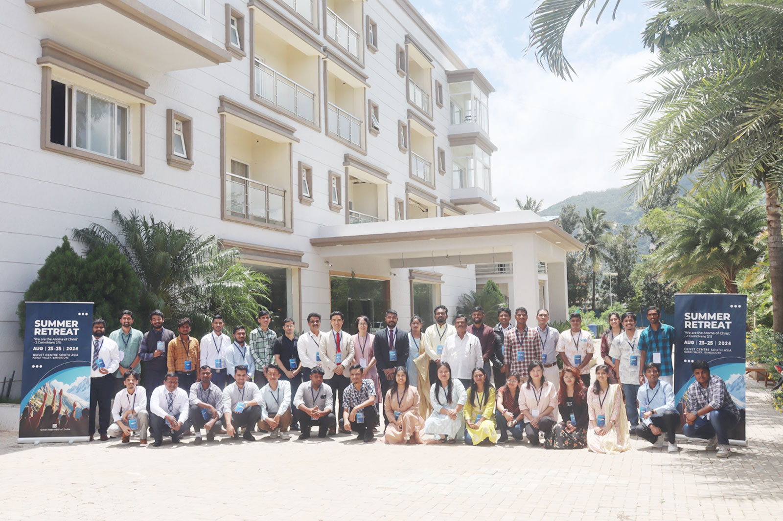 Summer Retreat 2024 attendants in front of the main building at Olivet Centre South Asia